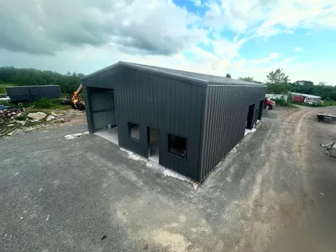 Custom steel workshop building on acreage